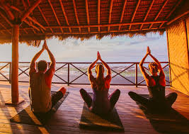 Peaceful yoga session overlooking mountain hot springs